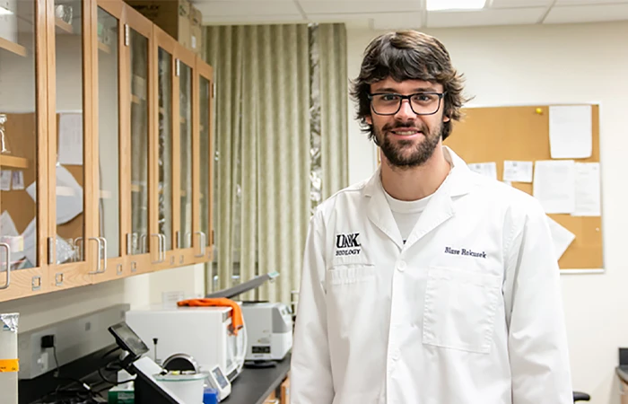 a student in a lab coat