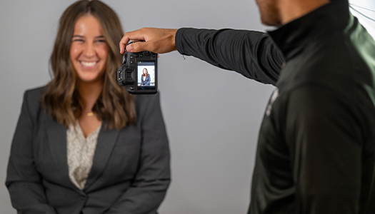 a student has her headshot taken