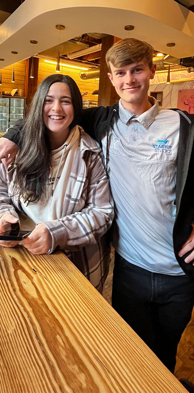 startup studio participants pose for a photo