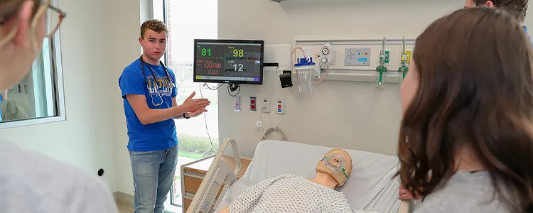 a student works in a clinical setting