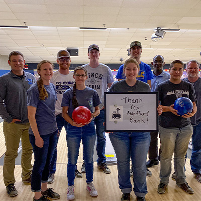 members of the agribusiness club pose for a photo at a bowling event