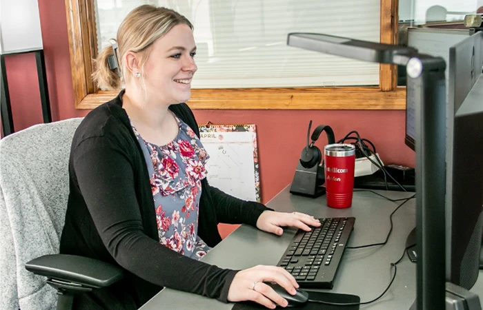 an mba grad works at a computer