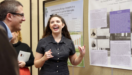 a student presents at research day