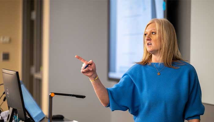 Sarah teaching at Accounting 250 class