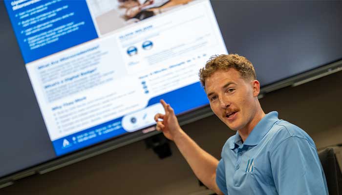 Nathan giving presentation to a client