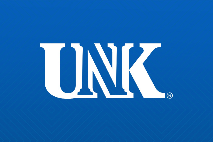 a blue textured background with the unk logo