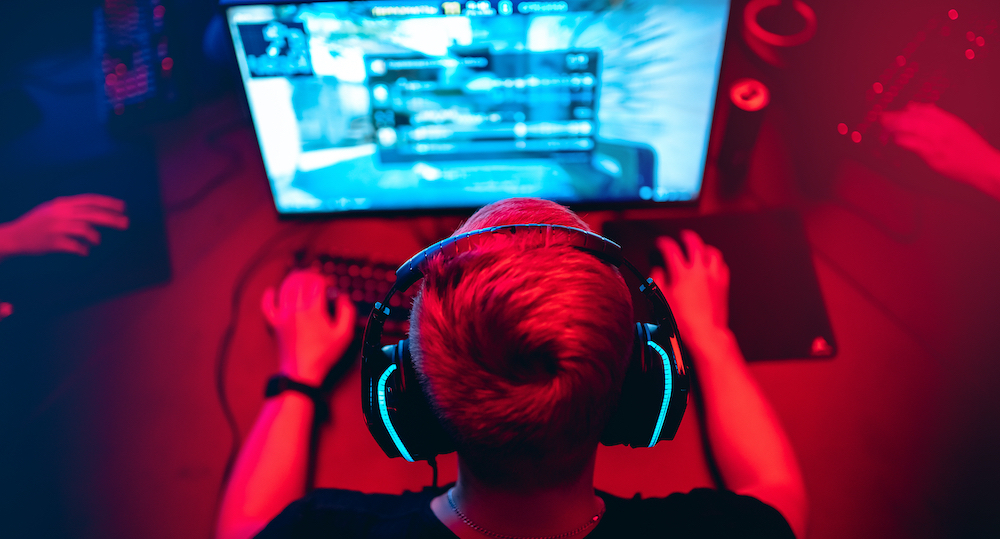 Guy playing PC games