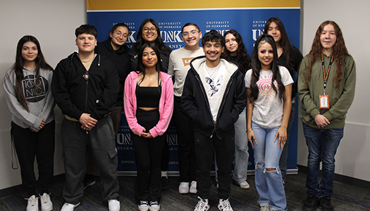 a group of students pose for a photo