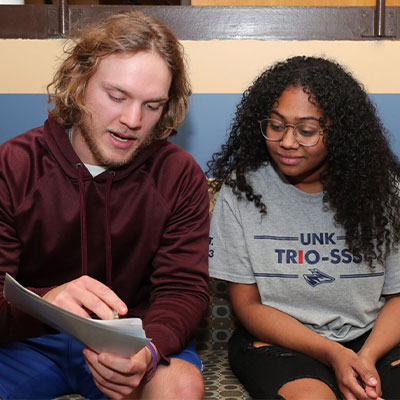 trio students sit and talk