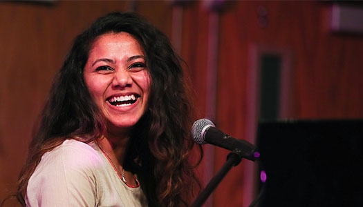 a student plays piano during the fame talent show 