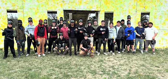 members of phi delta theta pose for a photo