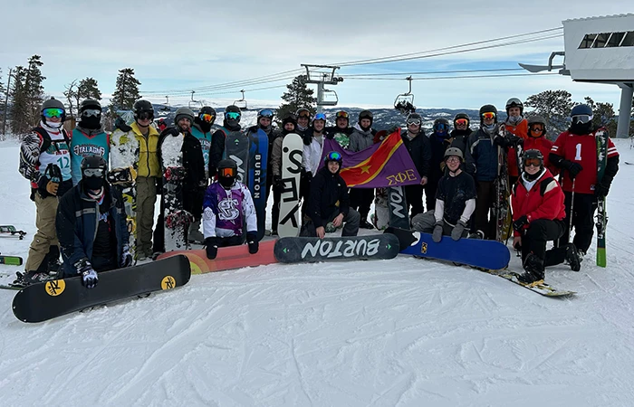 members of sigma phi epsilon pose for a photo