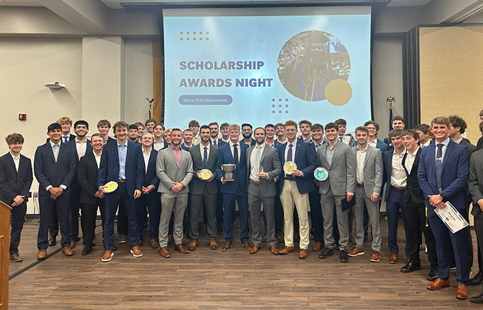 members of sigma phi epsilon pose for a formal photo